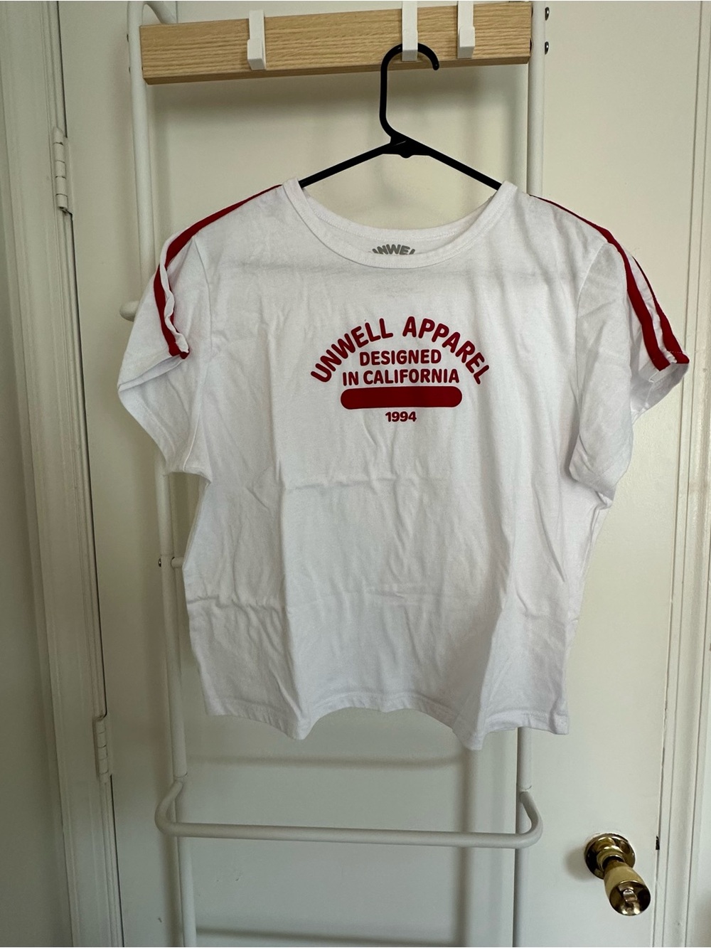 Unwell Apparel Women's White Short Sleeve Tee with Red Trim